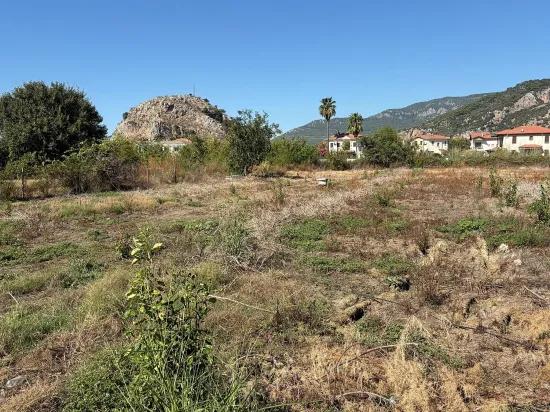 в Dalyan 3.180m2 %5 зонированный участок на продажу