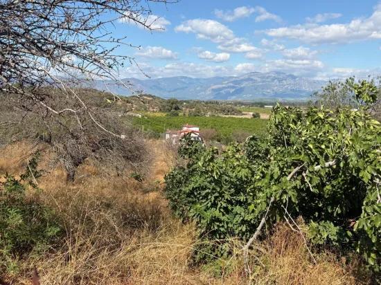 Поле площадью 5.000m2 с видом на озеро в Dalyan Karadağ продаётся